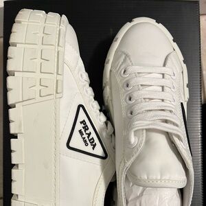 Prada Double Wheel Flatform Sneakers.